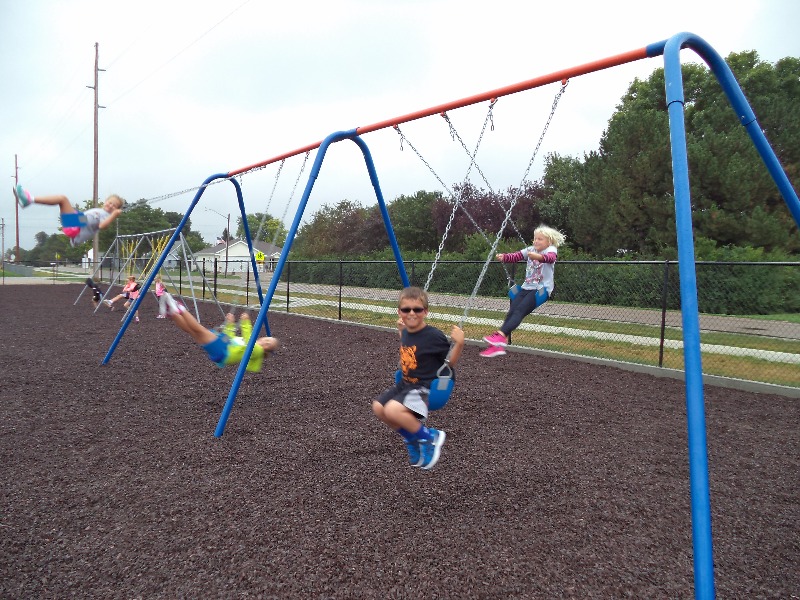 Osmond Community Schools Third graders enjoy OCS's new swing